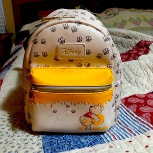 DISNEYS LOUNGE FLY WINNIE THE POOH MINI BACK PACK